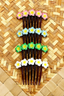 PUA FRANGIPANI SELU HAIRCOMB